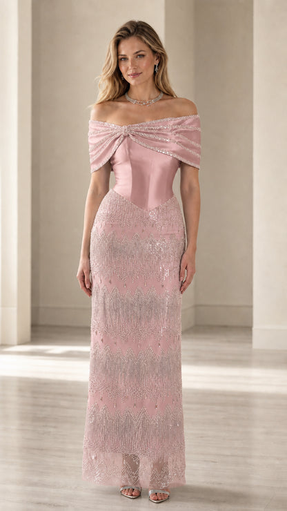 Front view of blush pink off-the-shoulder beaded formal gown