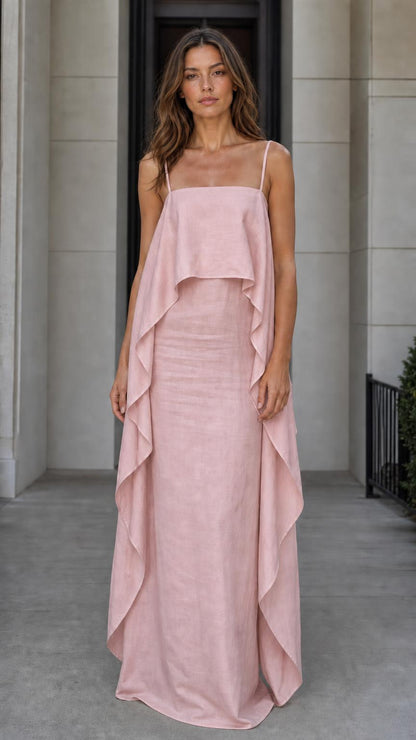 Model wearing the pink color variant of the flowing overlay maxi dress