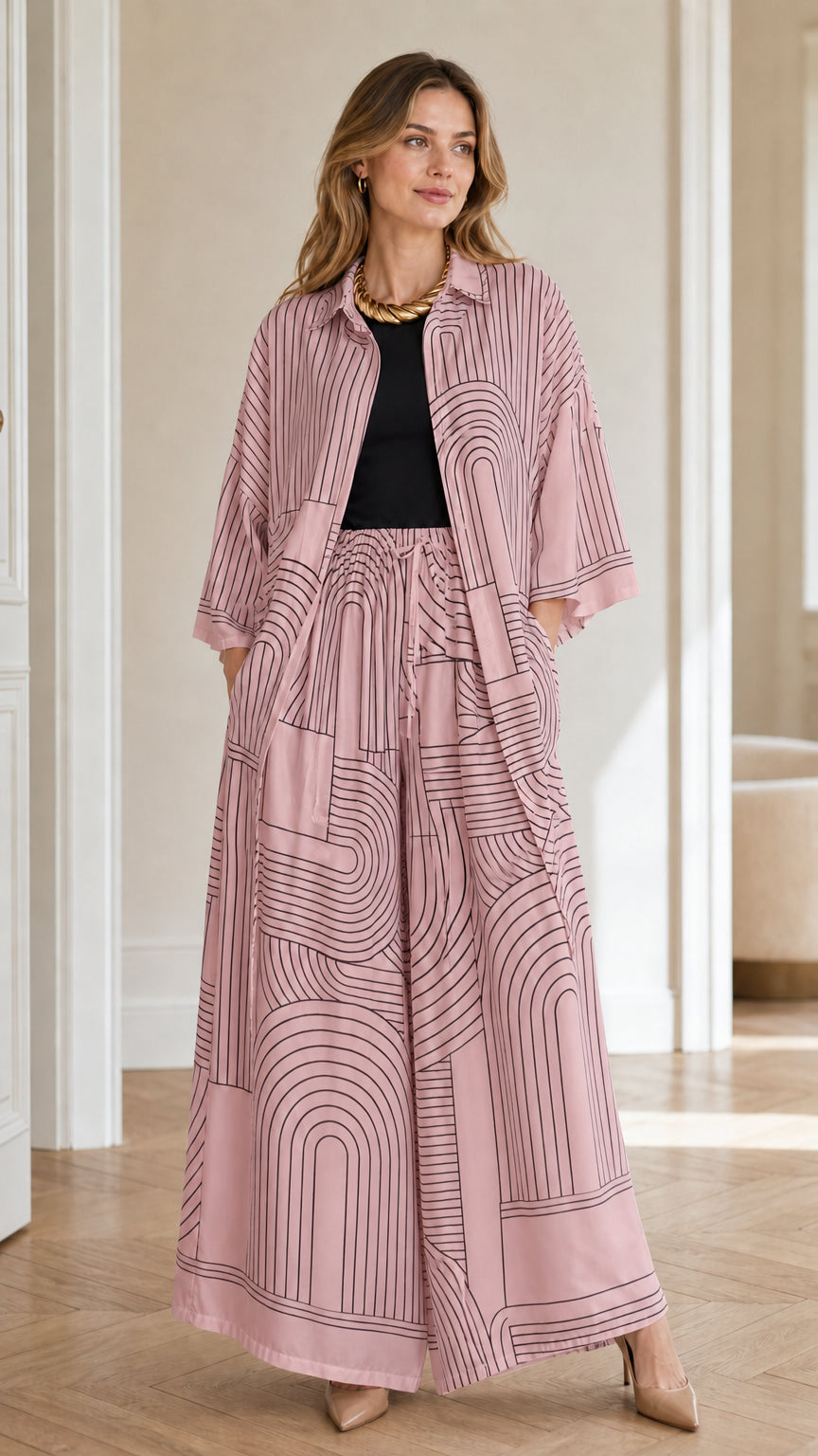 Model wearing pink geometric print matching set