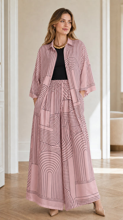Model wearing pink geometric print matching set
