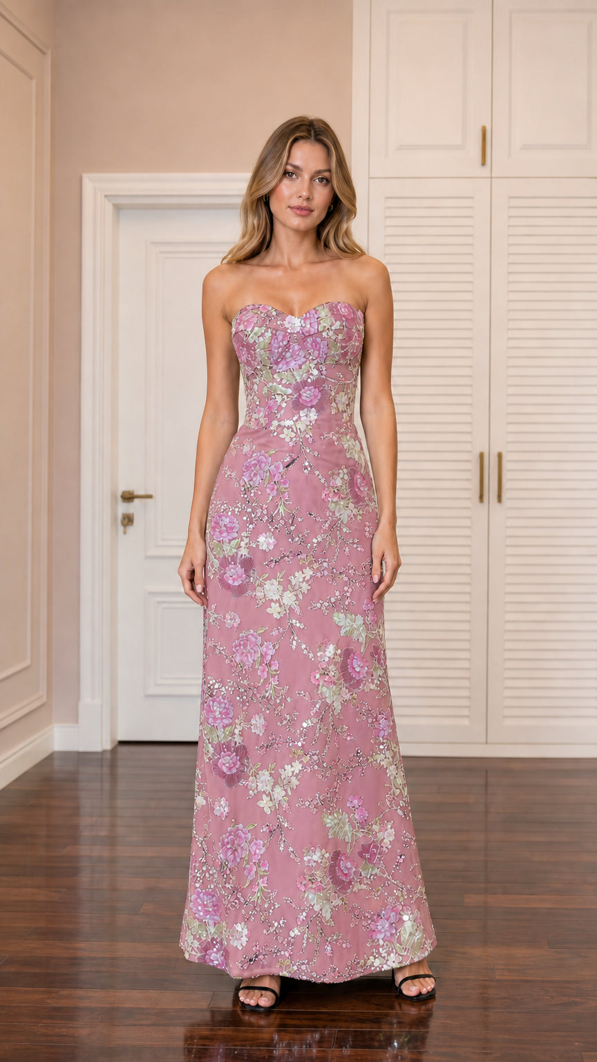 Front view of model wearing dusty pink sequin embroidered strapless maxi gown