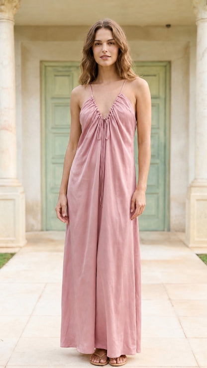 Model wearing dusty rose spaghetti strap maxi dress