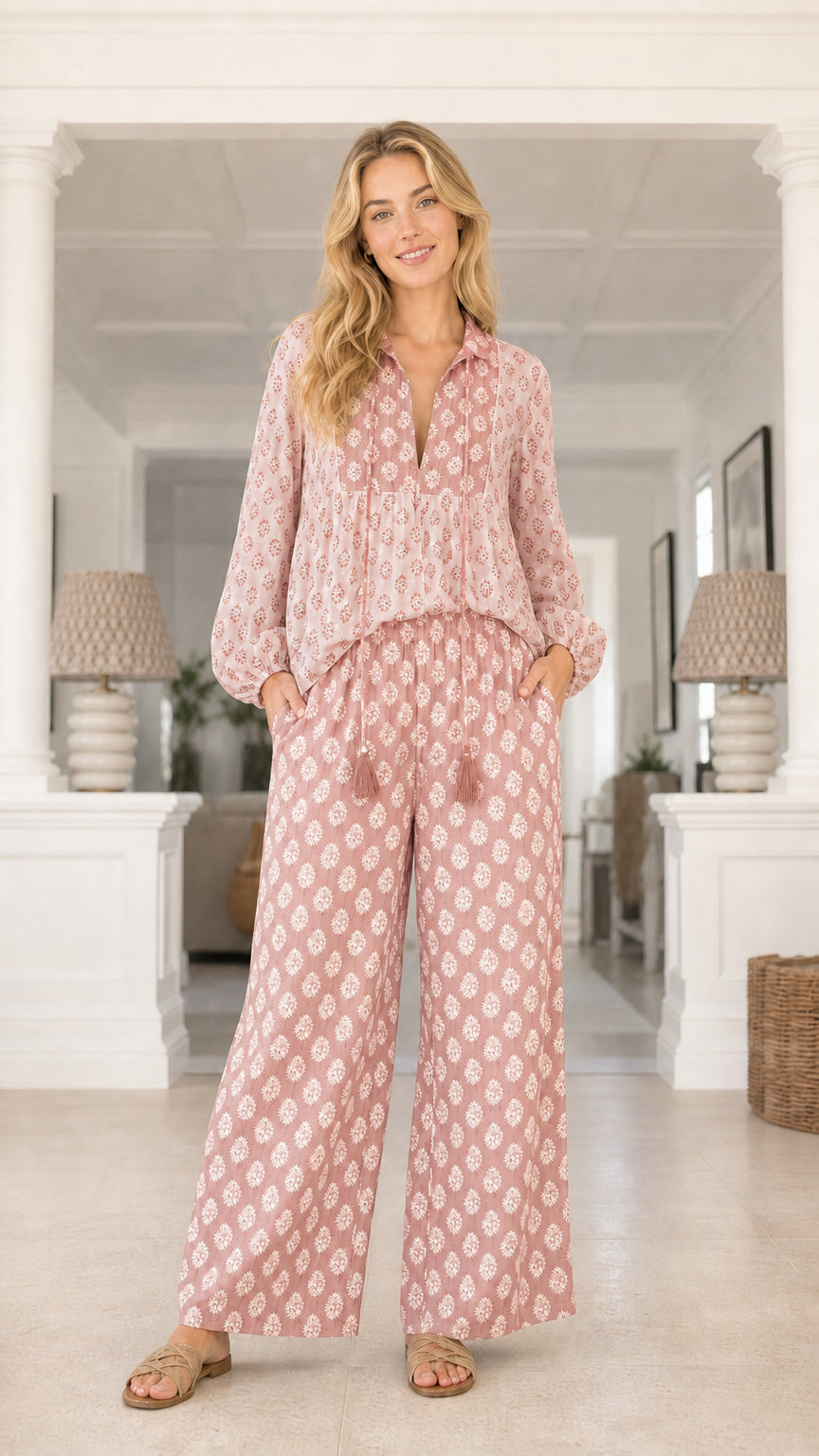 Model wearing blush pink printed two piece set