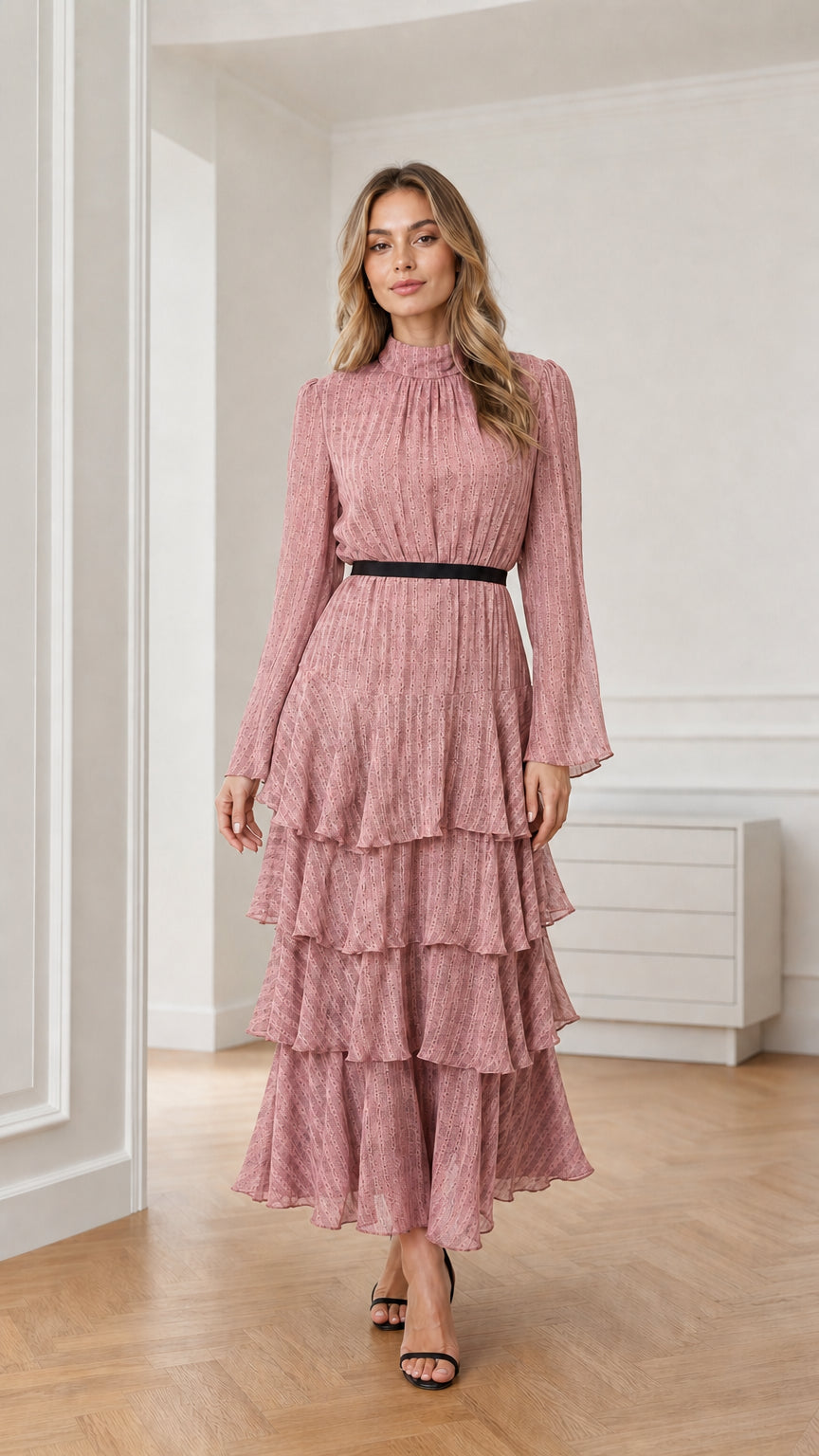 Model wearing dusty pink long sleeve tiered mock neck maxi dress