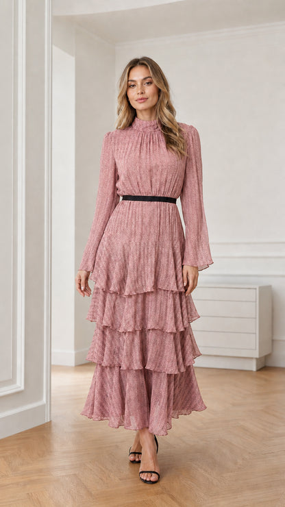 Model wearing dusty pink long sleeve tiered mock neck maxi dress