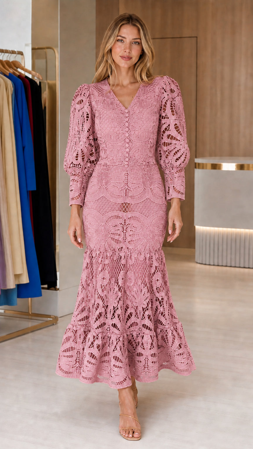 Front view of model wearing pink crochet lace midi dress