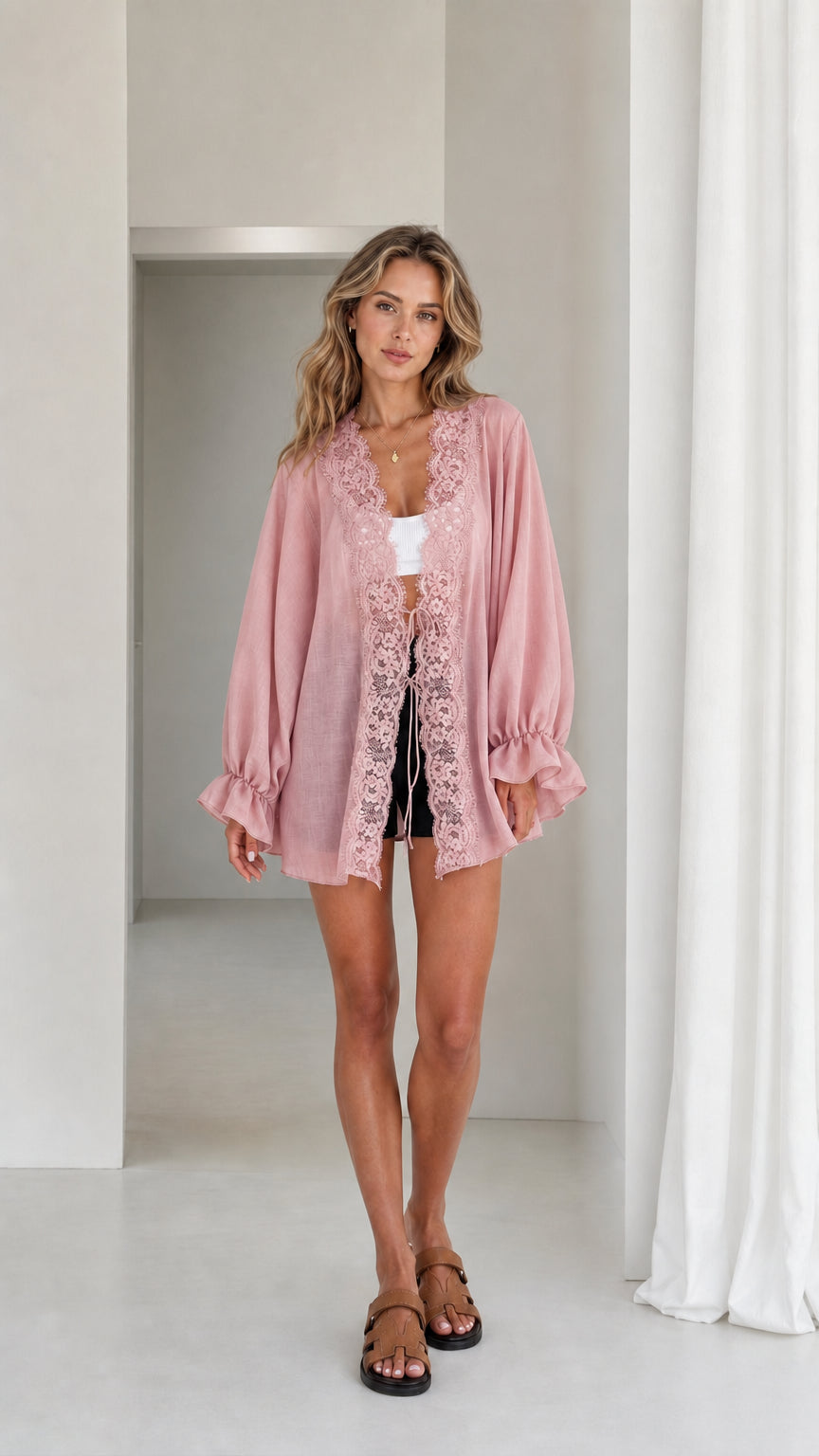 Model wearing dusty pink lace trim kimono cardigan