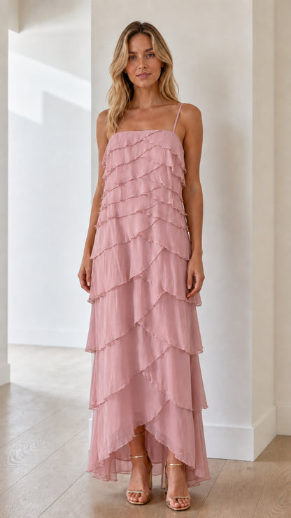 Model wearing pink tiered ruffle maxi dress