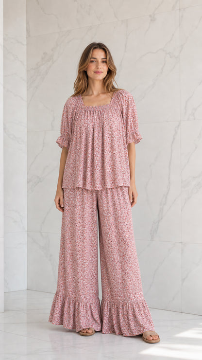 Model wearing dusty pink ditsy floral two-piece wide-leg pants set