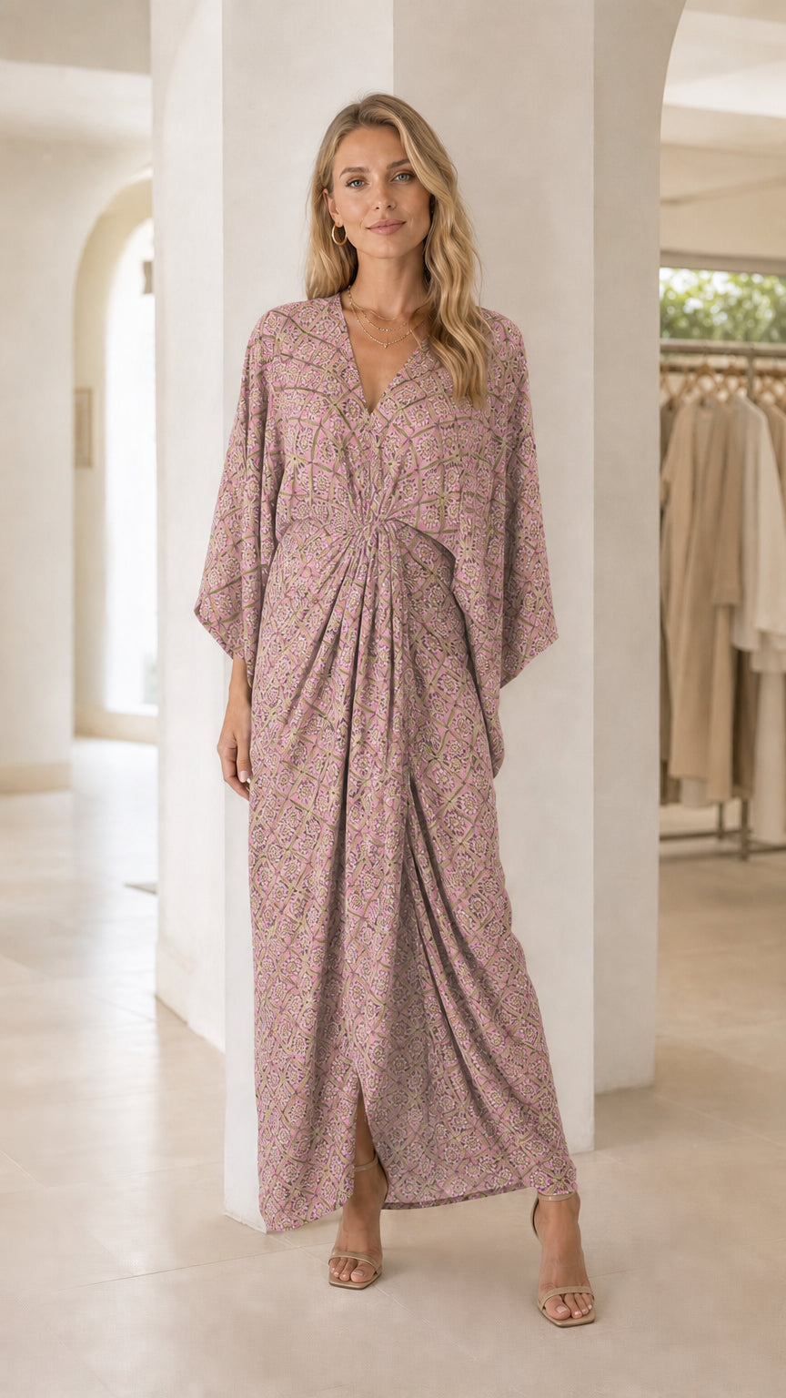 Model wearing pink printed V-neck maxi dress