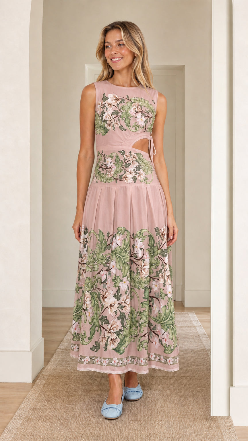 Woman wearing pink floral print cutout maxi dress