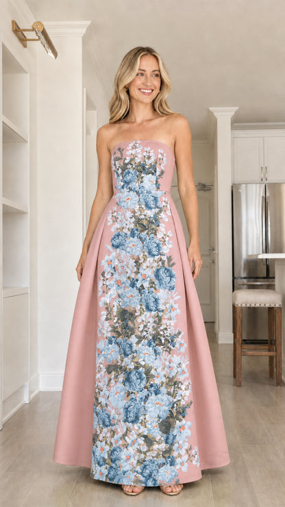Front view of model in pink floral strapless maxi dress