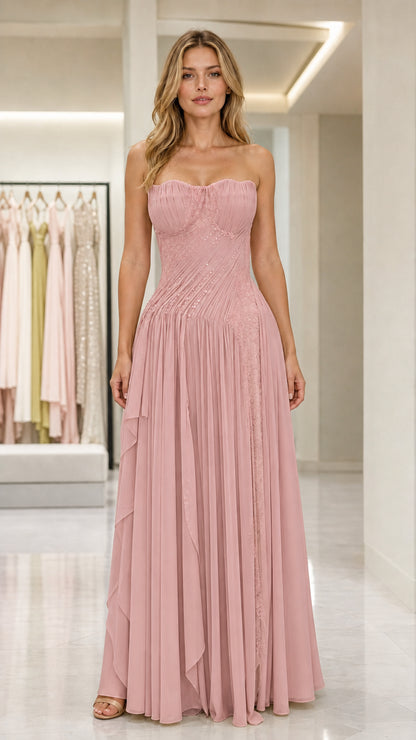 Front view of pink strapless pleated evening gown