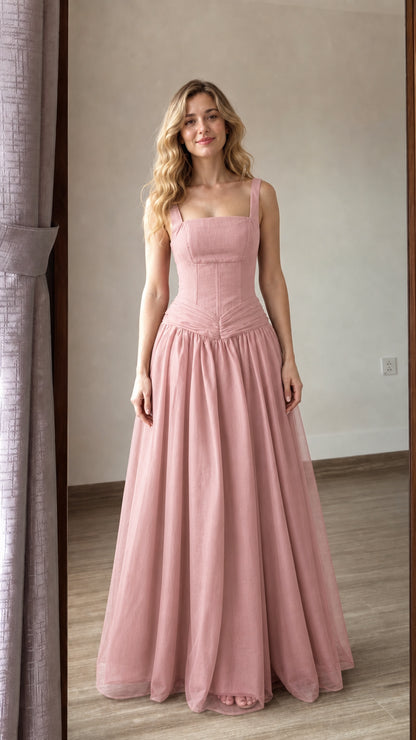 Front view of pink corset-style long tulle evening gown