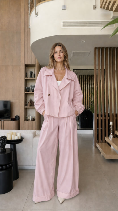 Front view of the blush pink cropped blazer and wide-leg pants set
