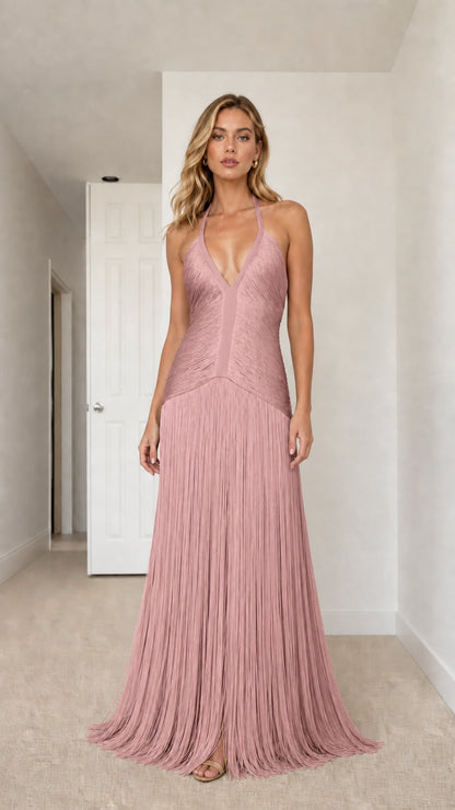 Model wearing blush pink deep plunge halter fringe maxi dress