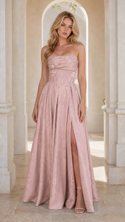 Model wearing dusty pink strapless jacquard formal dress