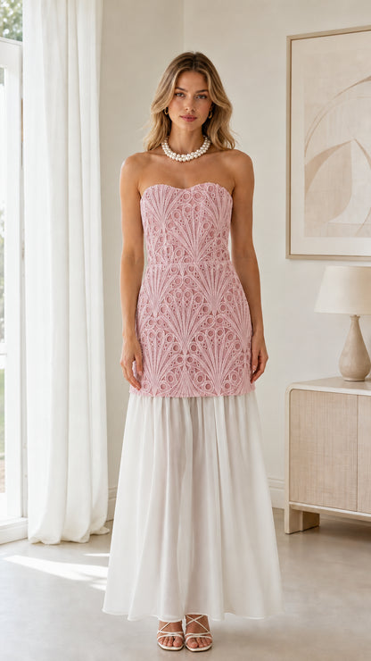 Front view of blush pink embroidered bodice with white skirt strapless maxi dress