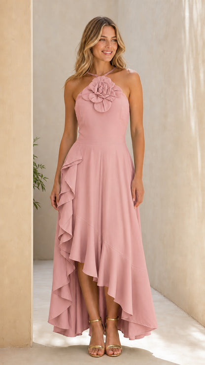Front view of dusty pink halter neck 3D rosette high-low ruffle maxi dress