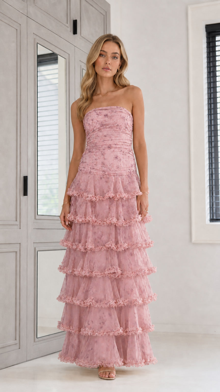 Front view of pink strapless tiered floral maxi dress