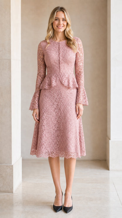 Front view of model wearing blush pink floral lace peplum midi dress