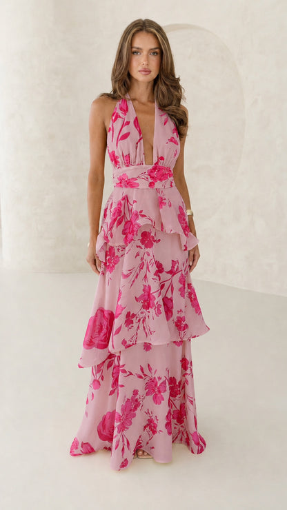 Front view of pink floral halter neck maxi dress
