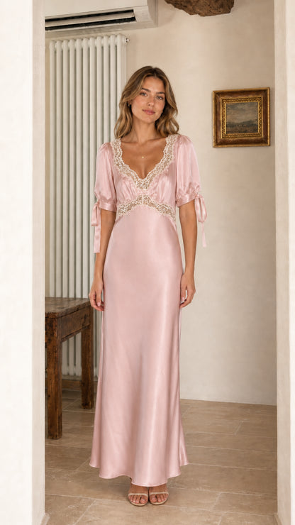 Front view of model wearing Pink satin lace trim maxi dress