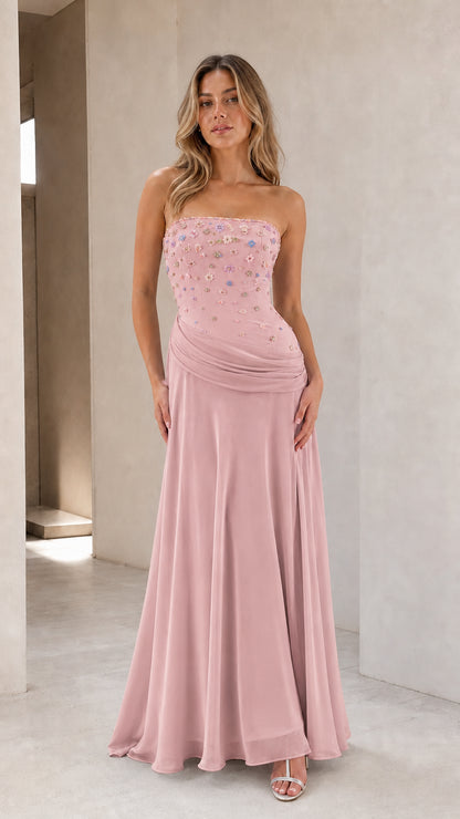 Full-length view of dusty pink strapless floral beaded evening gown