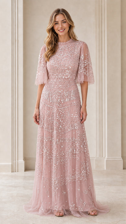 Front view of model wearing pink sequin evening gown