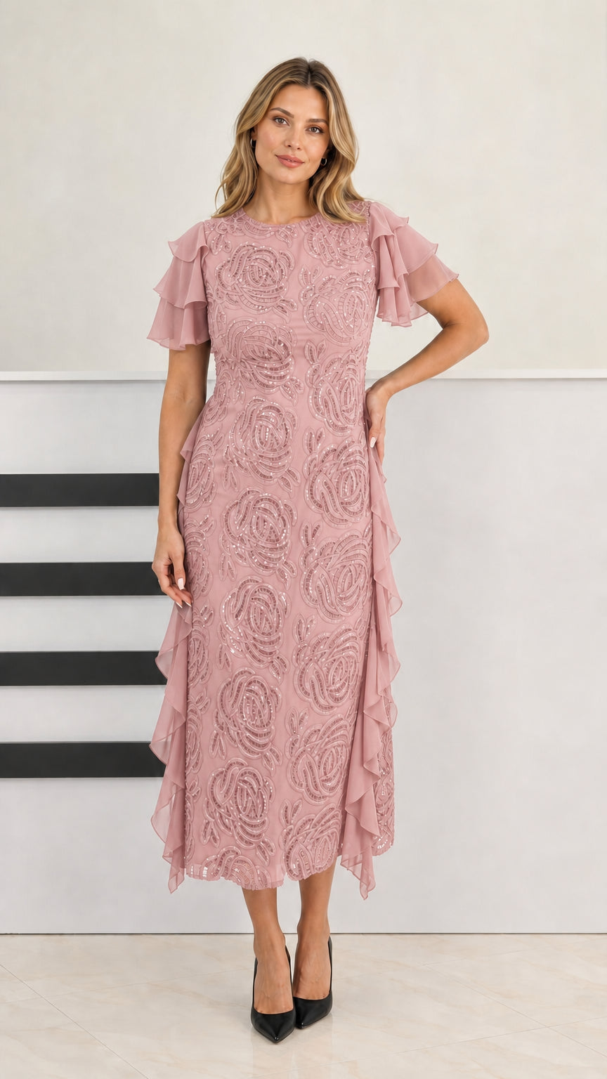 Model wearing dusty rose beaded midi dress