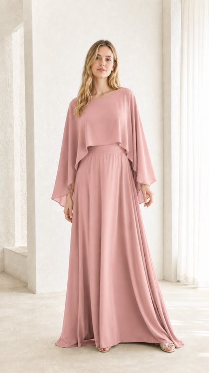 Woman wearing pink cape overlay maxi dress