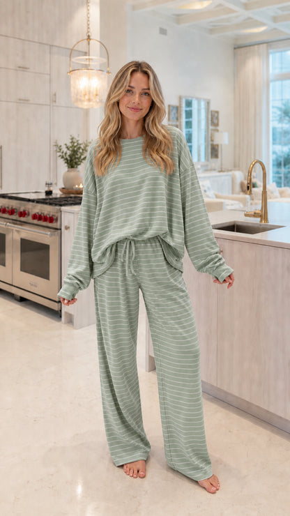 Front view of model wearing sage green and white striped knit lounge set