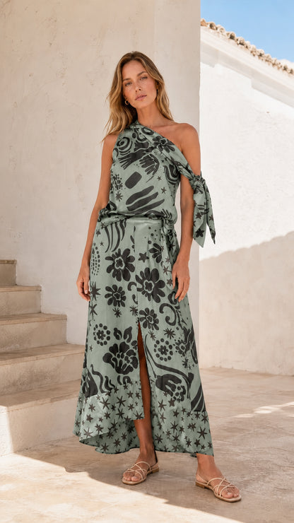 Model wearing sage green print one-shoulder maxi dress