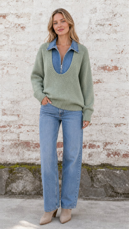 Model wearing sage green 2-in-1 knit sweater with denim collared insert