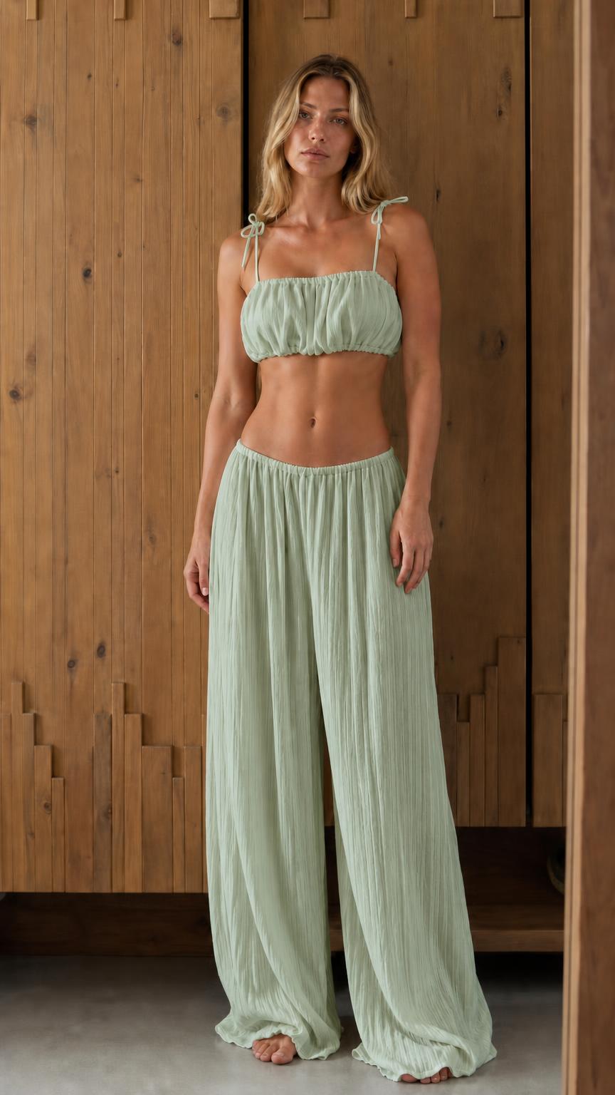 Front view of woman in sage green matching set