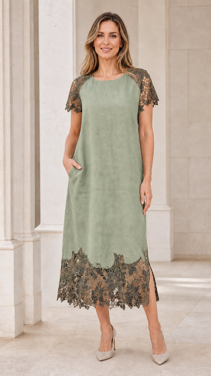 Model wearing sage green midi dress with lace accents