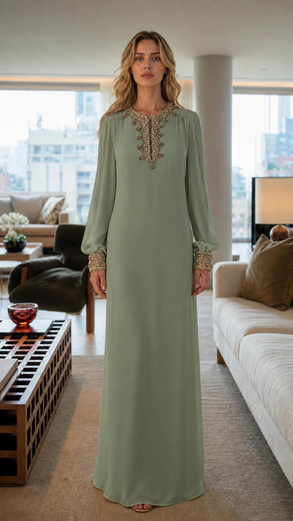 Front view of woman wearing sage embroidered long sleeve maxi dress