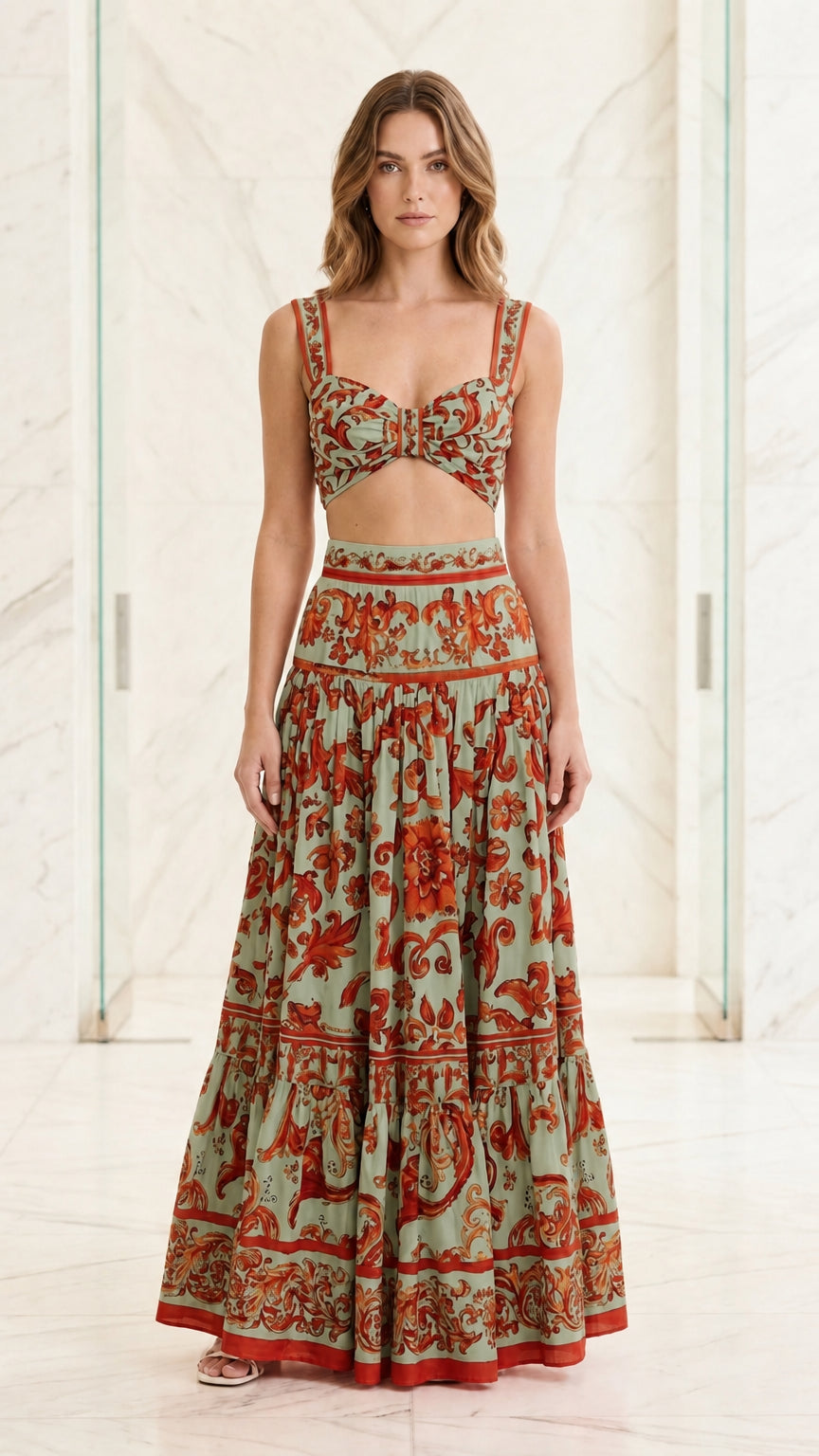 Woman wearing sage green and red baroque print two-piece set