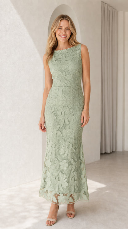Model wearing sage green sleeveless floral lace formal gown