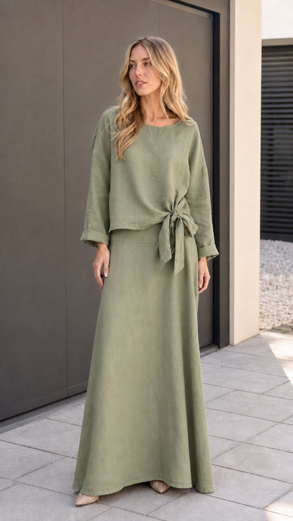 Model wearing sage green two-piece matching set