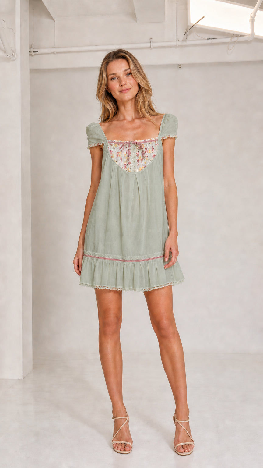 Sage green floral bib babydoll mini dress front view
