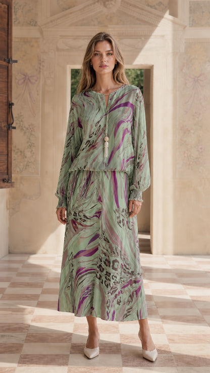 Model wearing green abstract print maxi dress set