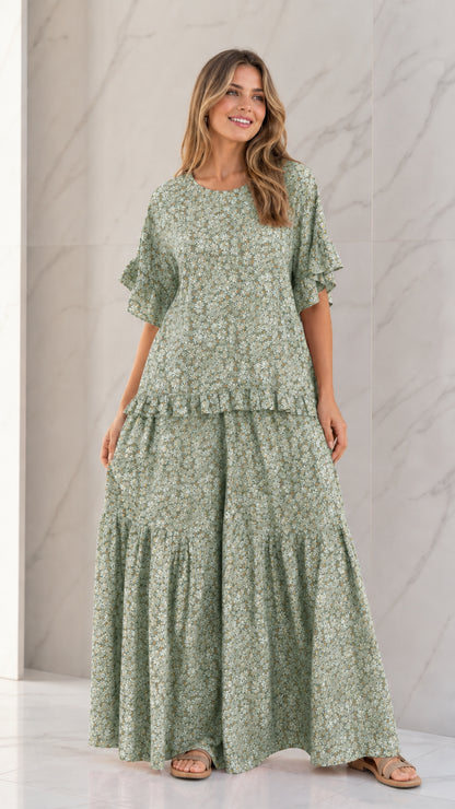 Front full view of woman wearing Sage Green floral ruffle sleeve top and wide-leg pants set