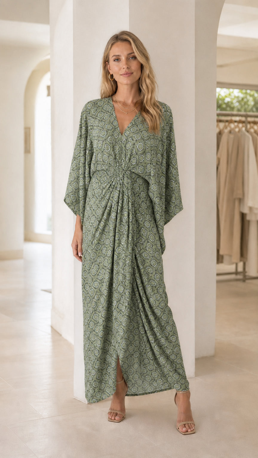 Model wearing green printed V-neck maxi dress