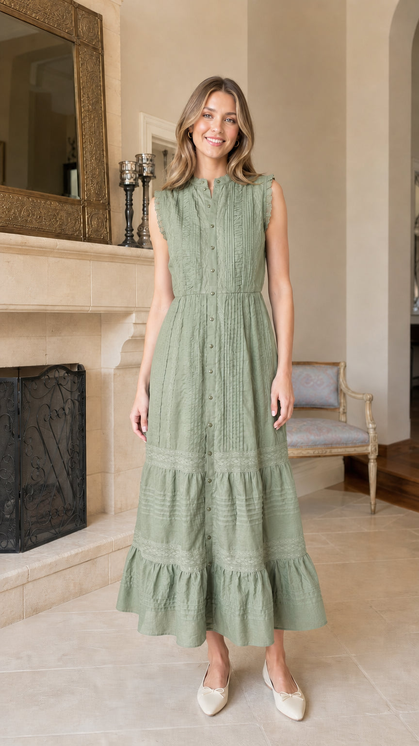 Front view of green sleeveless tiered midi dress