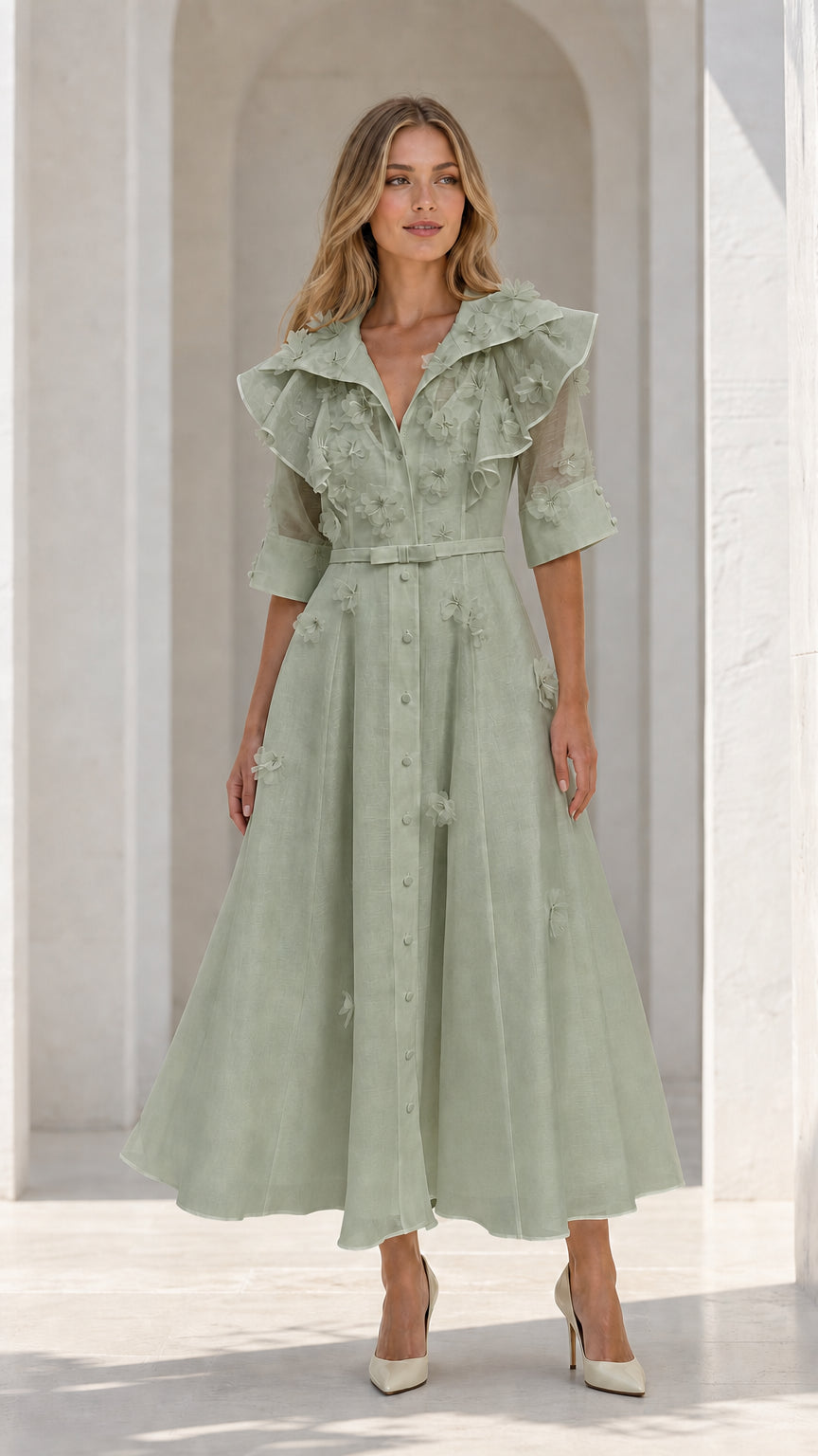 Model wearing sage green floral applique ruffle midi dress