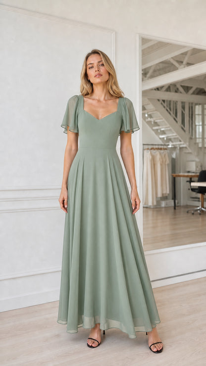 Full length view of sage green bridesmaid dress