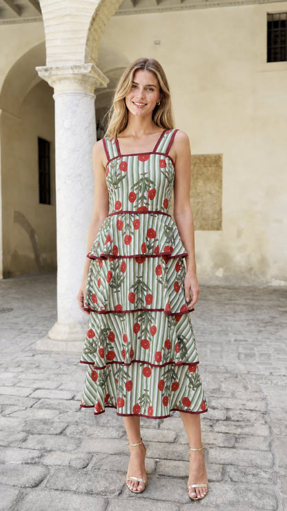 Model wearing green striped floral embroidered midi dress
