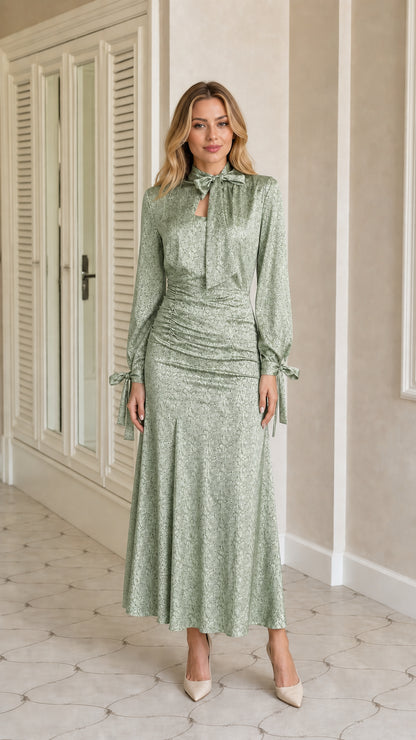 Full front view of sage green satin snakeskin print tie-neck maxi dress