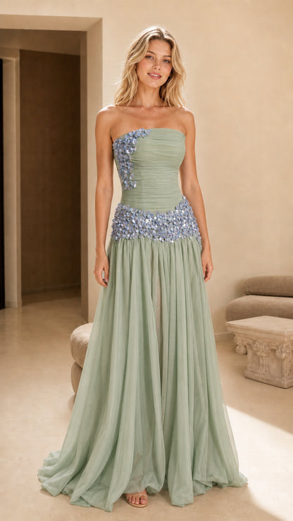Front view of sage green strapless formal gown